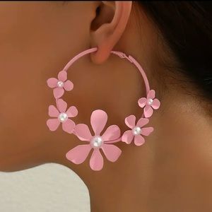 Pink hoop flower earrings with a pearl